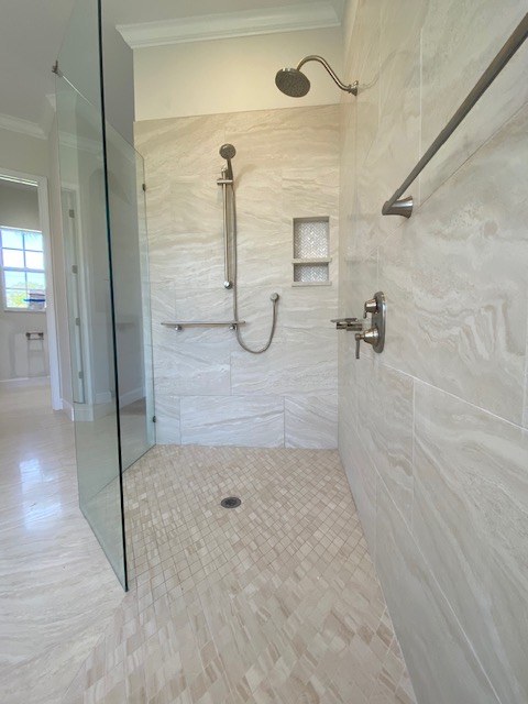 Walk-in shower with warm stone-look tile