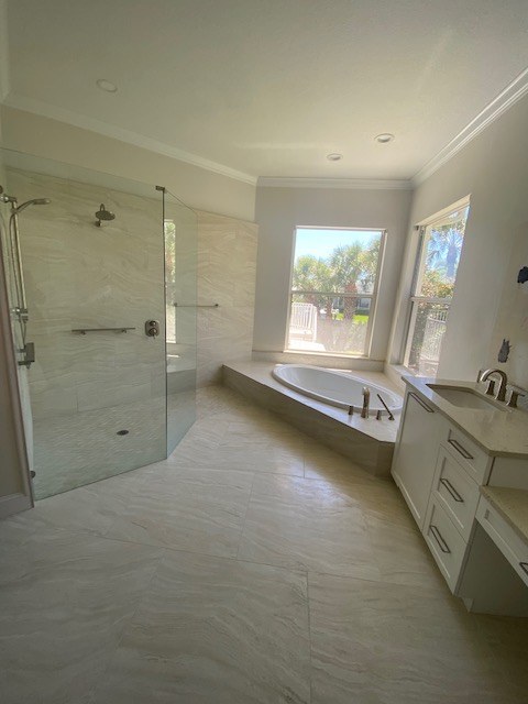 Bathroom with walk-in shower and soaking tub